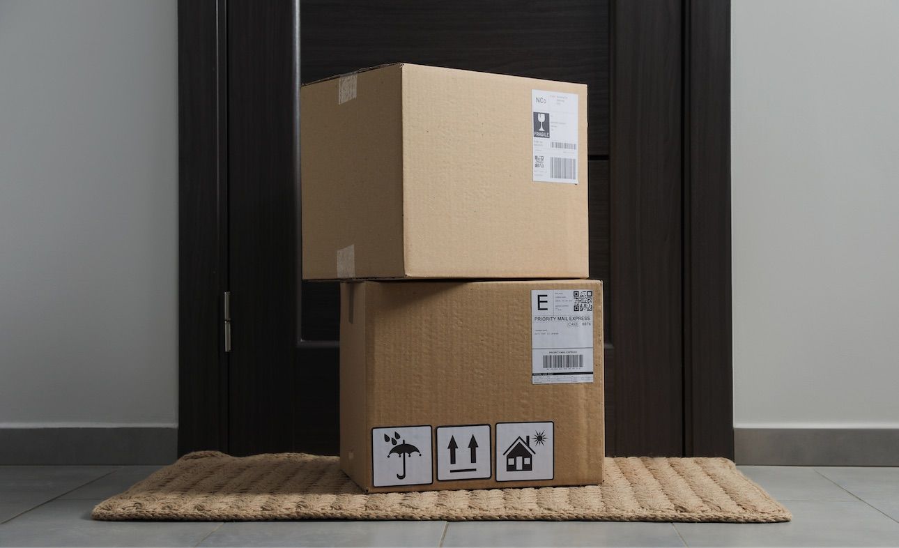 Cardboard boxes in front of door