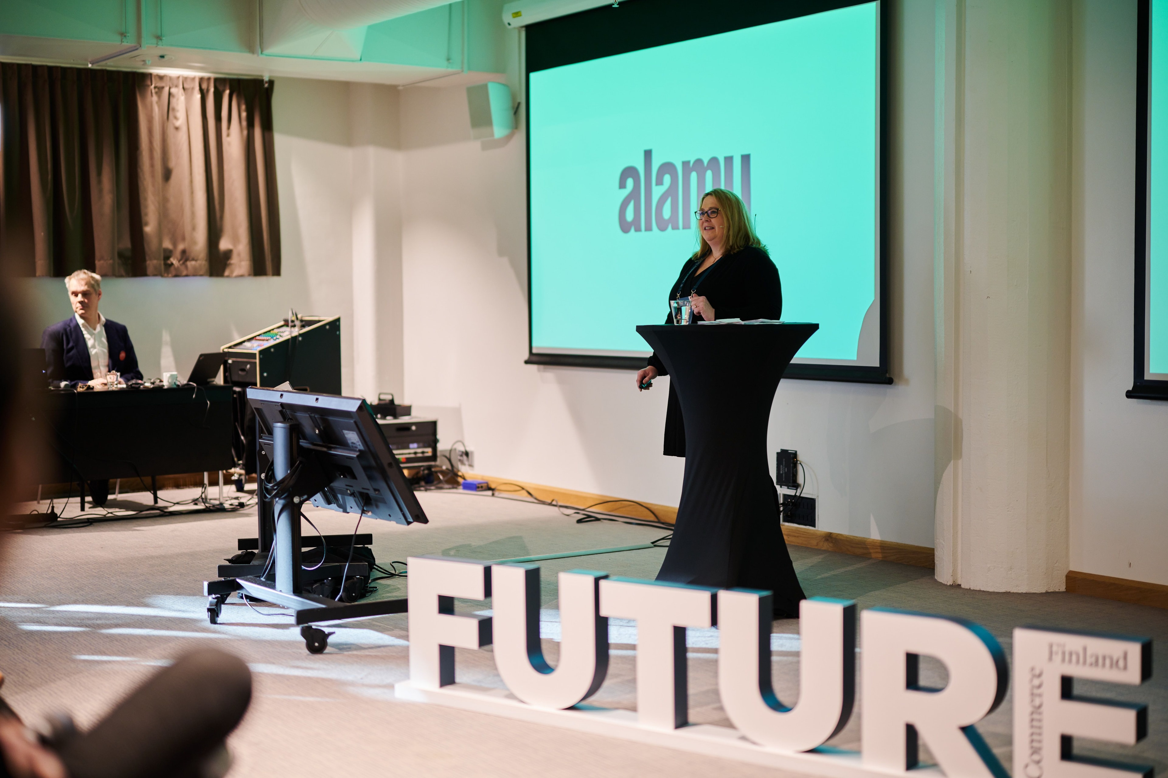 Woman speaking at a conference