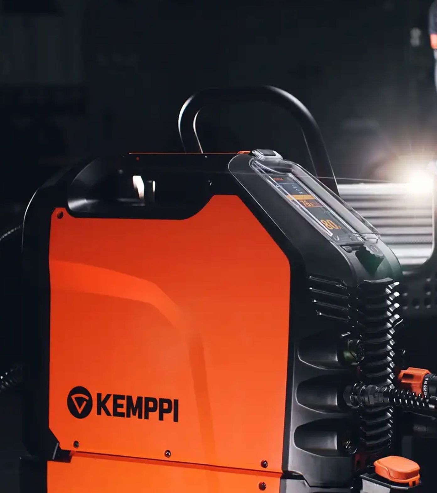 Black and orange Kemppi-branded device