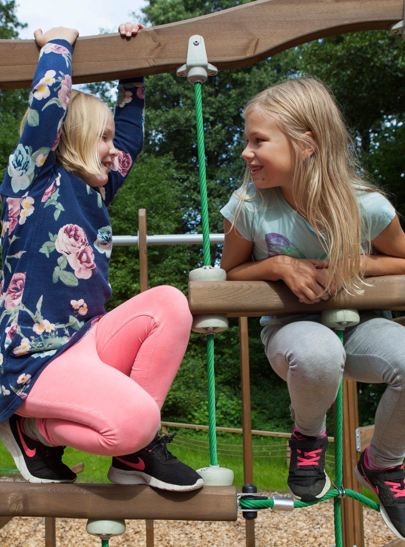 Two kids playing on the playground