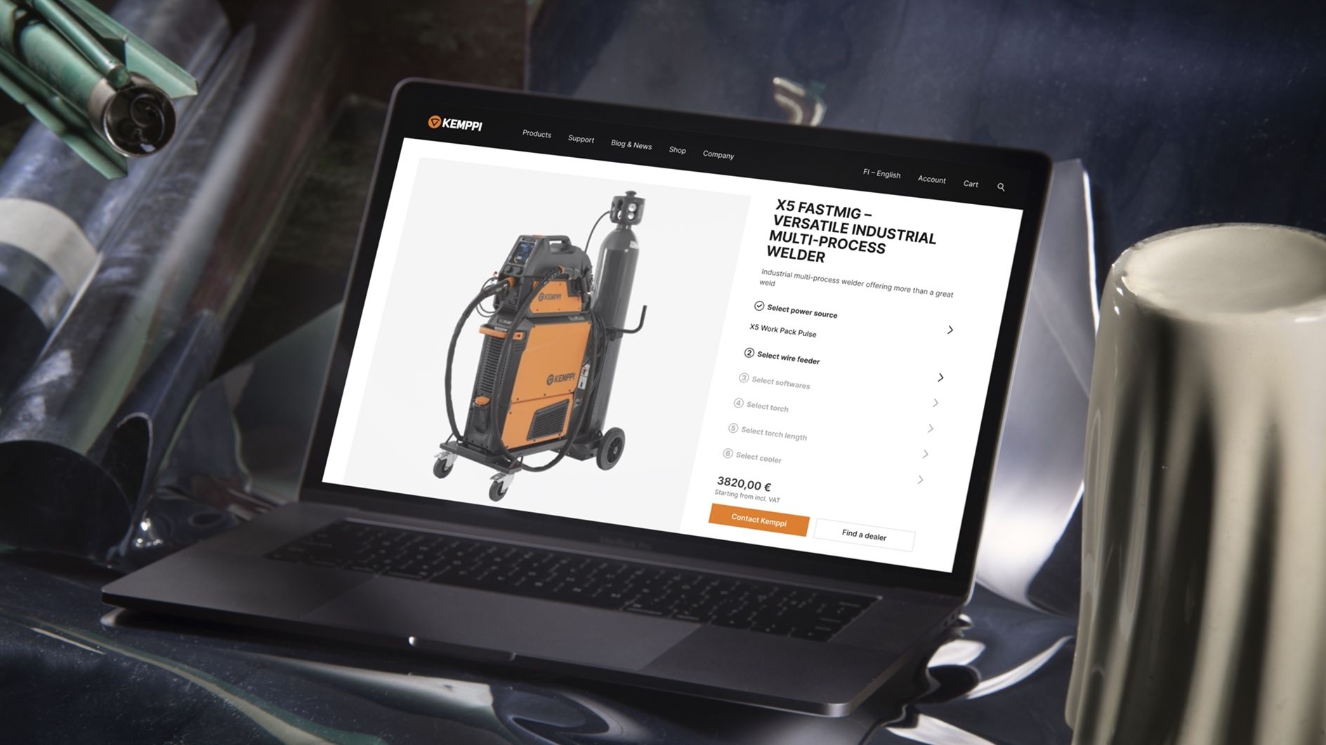 Laptop showing a Kemppi product in their webshop