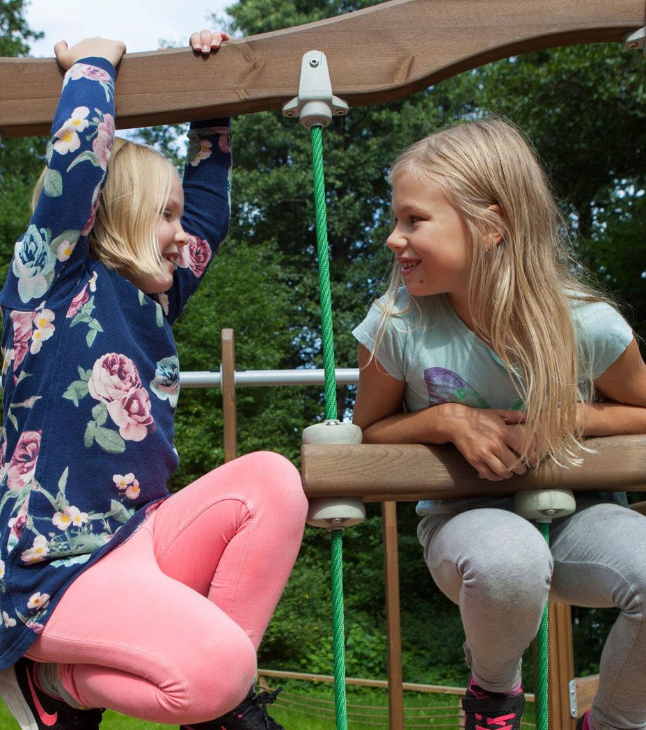 Two kids playing on the playground