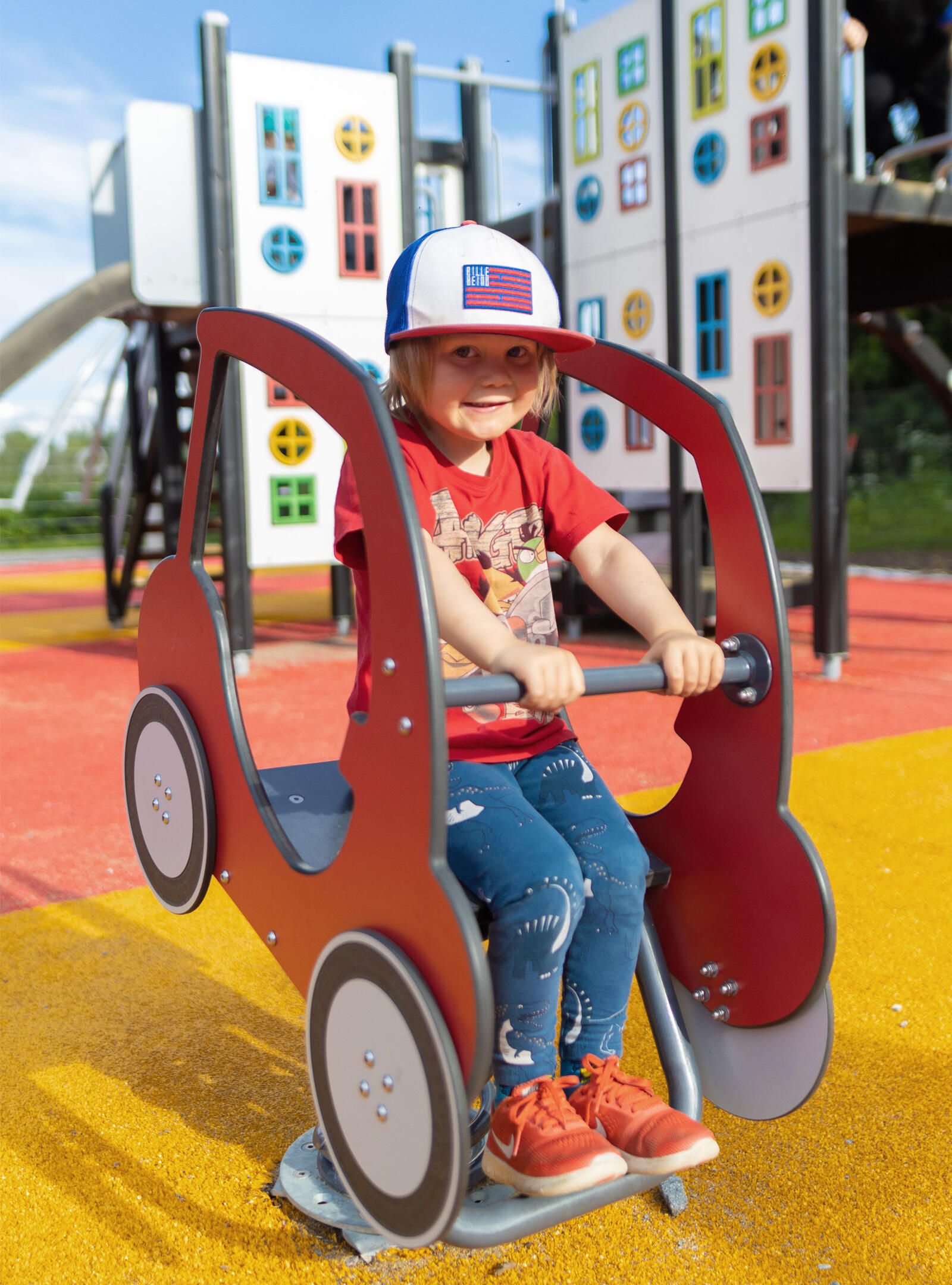 Child swinging on a playground
