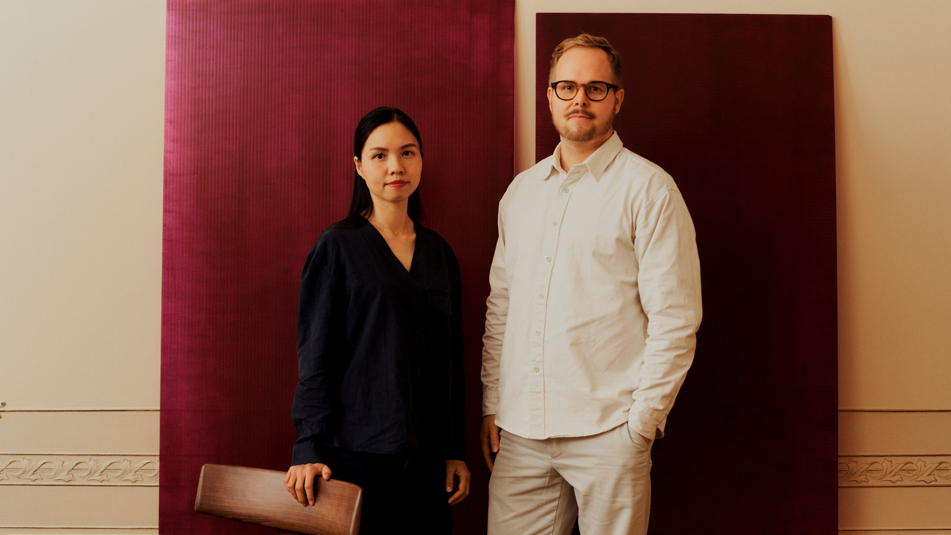 Two designers looking at the camera